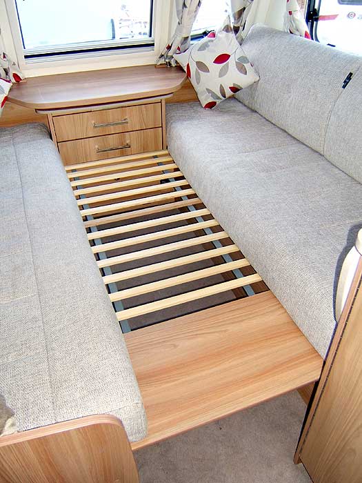 A handy occasional table that just pulls out when you need it and slides back in when you don't.